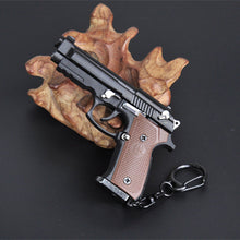 Load image into Gallery viewer, Mini Beretta M92 Shell Ejection Toy Gun Keychain
