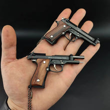 Load image into Gallery viewer, Mini Beretta M92 Toy Pistol Keychain
