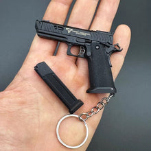 Load image into Gallery viewer, Mini Combat Master 2011 Shell Ejection Toy Gun Keychain
