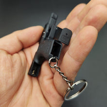 Load image into Gallery viewer, Mini Glock 17 Shell Ejection Toy Keychain
