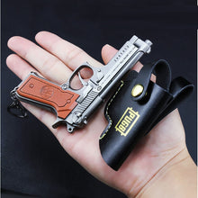 Load image into Gallery viewer, Mini R1895 Revolver P92 Toy Gun Keychain
