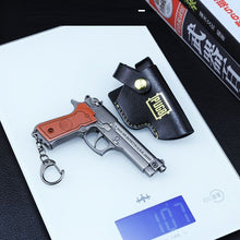 Load image into Gallery viewer, Mini R1895 Revolver P92 Toy Gun Keychain
